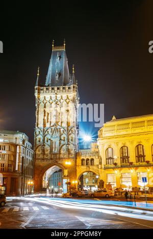 Night Traffic near Powder Tower or Powder Gate in Prague, Czech Republic. Stock Photo