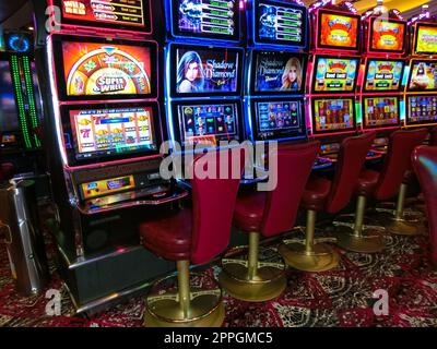 Miami, USA - April 29, 2022: Interior of slot machines in gambling casino on board new cruise ship or new flagship of MSC Seashore Stock Photo