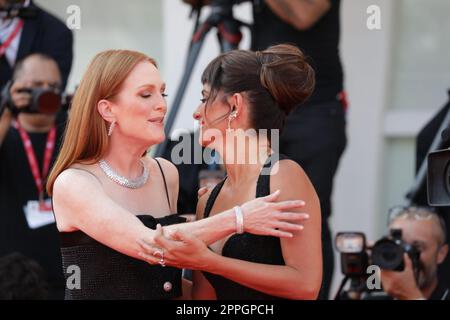 PenÃ©lope Cruz  with the Film En Los Margenes (On The Fringe) at the Venice Film Festival on the Red Carpet welcomes Julianne Moore (left) the president of the International Jury for the Venezia 79 Competition SEPTEMBER 6nd 2022 World premiere Stock Photo