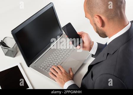 Businessman in office connected on internet network Stock Photo