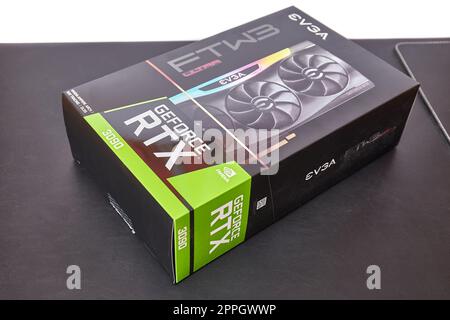 EVGA Geforce RTX 3090 Nvidia GPU box on a desk Stock Photo