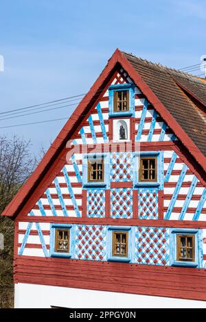 Half-timbered farmhouse, folk architecture in Milhostov, Western Bohemia, Czech Republic Stock Photo