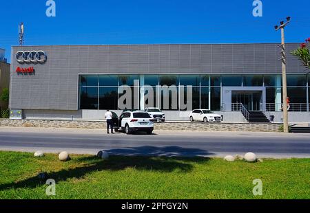 Antalya, Turkey - September 17, 2022: Audi dealership seen from outside. Audi AG is a German automotive manufacturer headquartered in Ingolstadt, Bavaria, Germany. Stock Photo