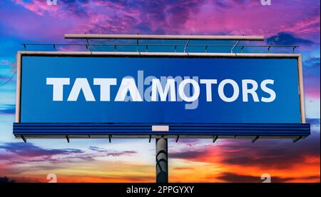 Advertisement billboard displaying logo of Tata Motors Stock Photo