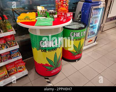 Baden-Baden, Germany - January 01, 2022: Window of bio store with various legal cannabis products Stock Photo