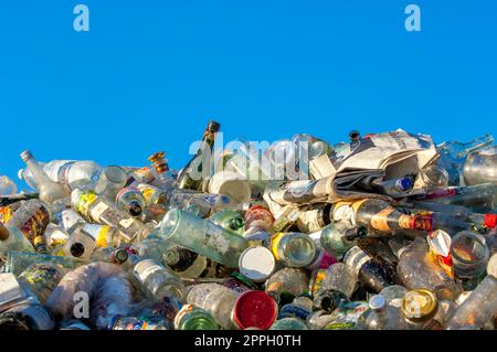 Glass bottles in a recycling plant waiting for recycling Stock Photo