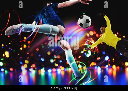 Football player ready to kicks the soccer ball at the stadium Stock Photo
