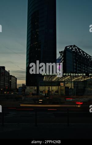 Vertical shot of a skyscraper at Potsdamer Platz at night Stock Photo