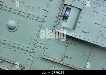 Abstract green industrial metal textured background with rivets and bolts Stock Photo