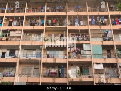 Balconies on a decaying and overcrowded apartment building in Saigon, Vietnam (Ho Chi Minh City) Stock Photo