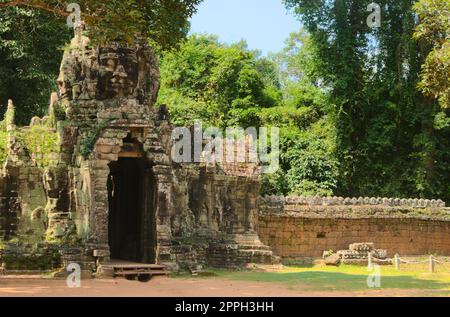 Face tower on the eastern entrance of Banteay Kdei temple, in Angkor Wat city complex, Cambodia. Stock Photo
