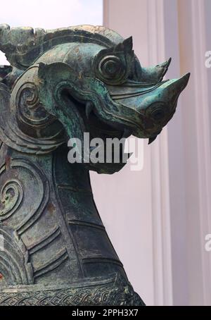 Bronze statue of a Singha guardian lion, one the many leogryphs (lion-like creatures) of asian and buddhist mythology. Stock Photo