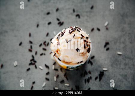 Ice cream Thai style dessert on vintage concrete stone background Stock Photo