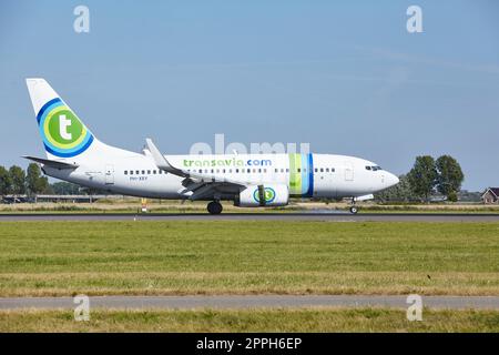 Amsterdam Airport Schiphol - Boeing 737-7K2 of transavia lands Stock Photo