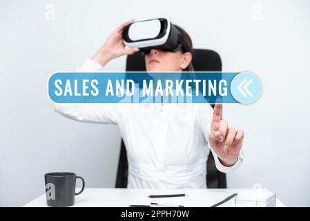 Text sign showing Sales And Marketing. Internet Concept Promotion Selling Distribution of Goods or Services Stock Photo