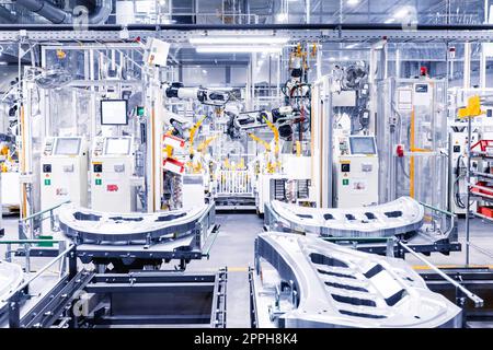robots in a car plant Stock Photo