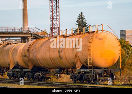 Last tank with oil petroleum of the cargo train Stock Photo