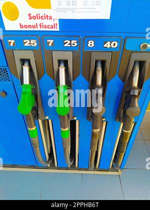 Bacau, Romania - September 11, 2022: Filling nozzles at a OMV gas station. Stock Photo