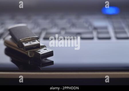 Memory cards on the laptop keyboard Stock Photo