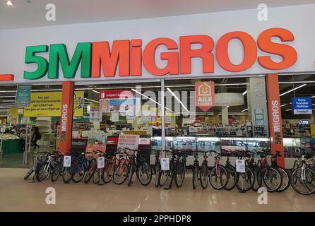 Chorlu, Turkey - September 23, 2022: Migros supermarket logo hanging on a building in Chorlu Stock Photo