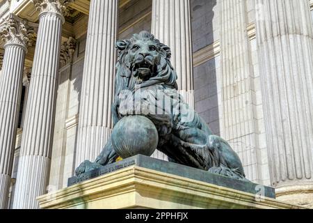 Parliament facade columns and lion in Madrid, Spain. Congreso diputados Stock Photo