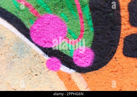 Colorful lines and shapes spray painted on a wall Stock Photo