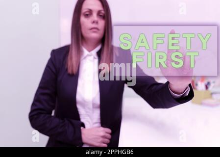 Handwriting text Safety First. Business overview Avoid any unnecessary risk Live Safely Be Careful Pay attention Stock Photo