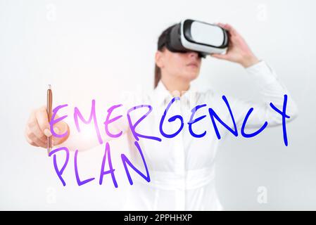 Hand writing sign Emergency Plan. Word Written on Procedures for response to major emergencies Be prepared Stock Photo