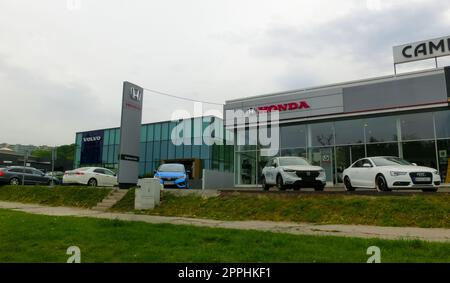 Exterior view of Honda dealership in Slovakia. Honda Motor Company, Ltd. is a Japanese public multinational conglomerate corporation. Stock Photo