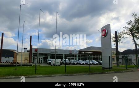 Fiat dealership sign logo on car store Italian automobile manufacturer Stock Photo