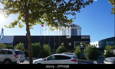 Antalya, Turkey - September 17, 2022: Mini logo sign and brand text on car automobiles store building at Mini Cooper dealership shop Stock Photo