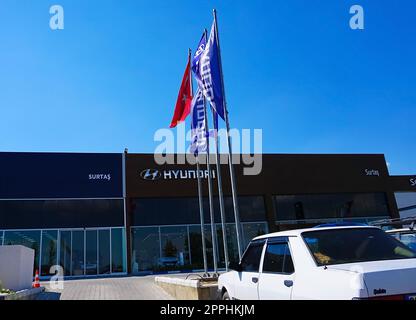 Antalya, Turkey - September 17, 2022: Hyundai logo on the showroom building on a sunny day. Hyundai Kia is a South Korean manufacturer of automobiles and commercial vehicles Stock Photo