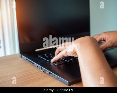 Human hand working on computer. business concept and communication technology Stock Photo