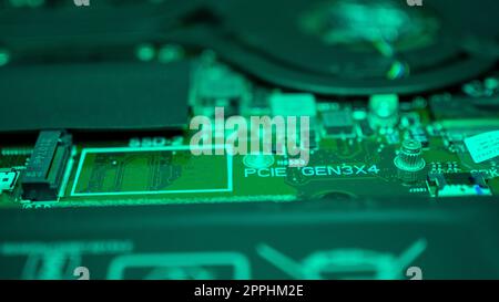 Circuit board with resistors microchips and electronic components. Computer hardware technology. Integrated communication processor. Information engineering. PCB. Stock Photo