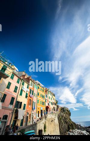 Riomaggiore of Cinque Terre, Italy - Traditional fishing village in La Spezia, situate in coastline of Liguria of Italy. Riomaggiore is one of the five Cinque Terre travel attractions. Stock Photo