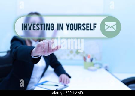 Text sign showing Investing In Yourself. Business concept Learning new skill Developing yourself professionally Stock Photo