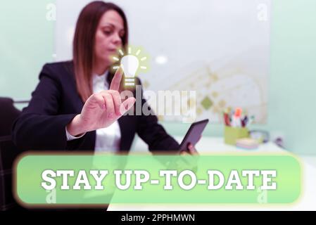 Sign displaying Stay Up To Date. Conceptual photo knows all the most recent news and changes in a situation Stock Photo