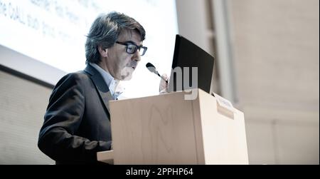 Speaker giving talk at Business Conference. Stock Photo