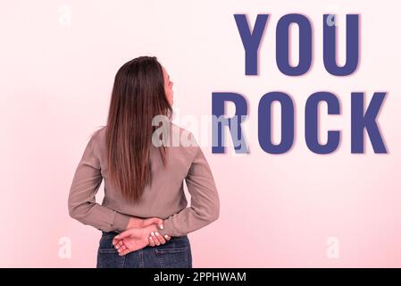 Inspiration showing sign You Rock. Business concept slang phrase of praise or encouragement conveying you are awesome Stock Photo