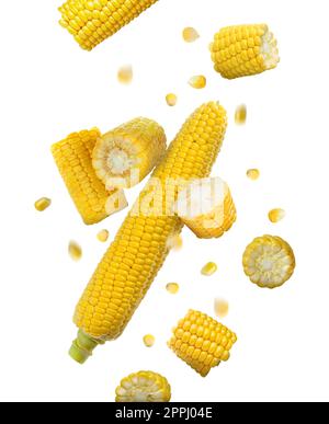 Tasty ripe corn cobs falling on white background Stock Photo