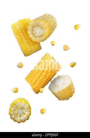 Tasty ripe corn cobs falling on white background Stock Photo