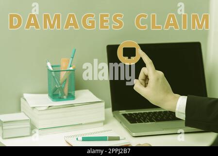 Writing displaying text Damages Claim. Word Written on Demand Compensation Litigate Insurance File Suit Stock Photo