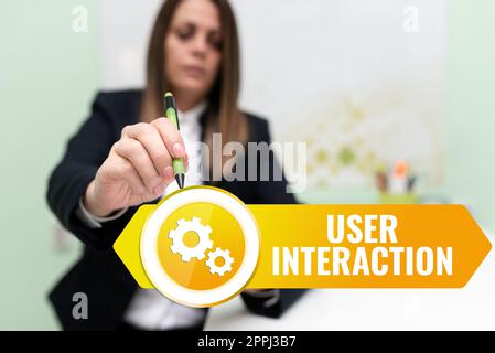 Text caption presenting User Interaction. Word for how the customer acts on the system and vice versa Businesswoman Holding Speech Bubble With Important Messages. Stock Photo