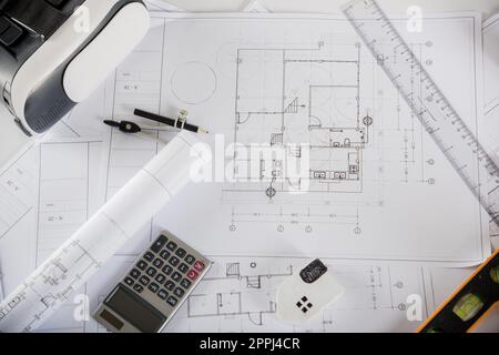 Architect workplace top view. Architectural blueprint paper project plans on desk table Stock Photo