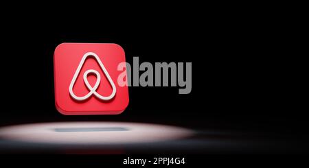 Airbnb App Icon Spotlighted on Black Background Stock Photo