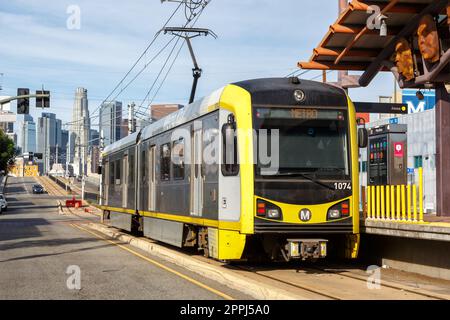 Metro Rail Gold Line light rail train public transport at Pico Aliso stop in Los Angeles, United States Stock Photo