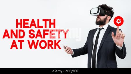 Hand writing sign Health And Safety At Work. Word Written on Secure procedures prevent accidents avoid danger Stock Photo