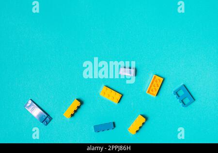 Constructor children plastic multi-colored on a pastel blue Stock Photo