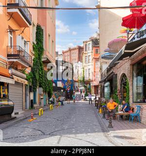 Alley with cobblestone floor, and colorful old buildings in Balat district, Istanbul, Turkey Stock Photo