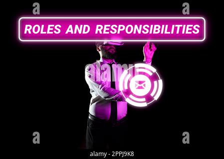 Text sign showing Roles And Responsibilities. Business showcase Business functions and professional duties Stock Photo